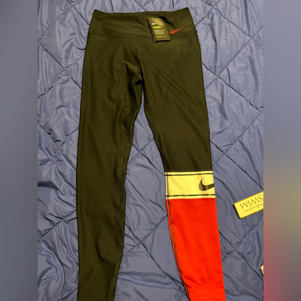Brand New Nike Dri-Fit leggings Black with red leg.